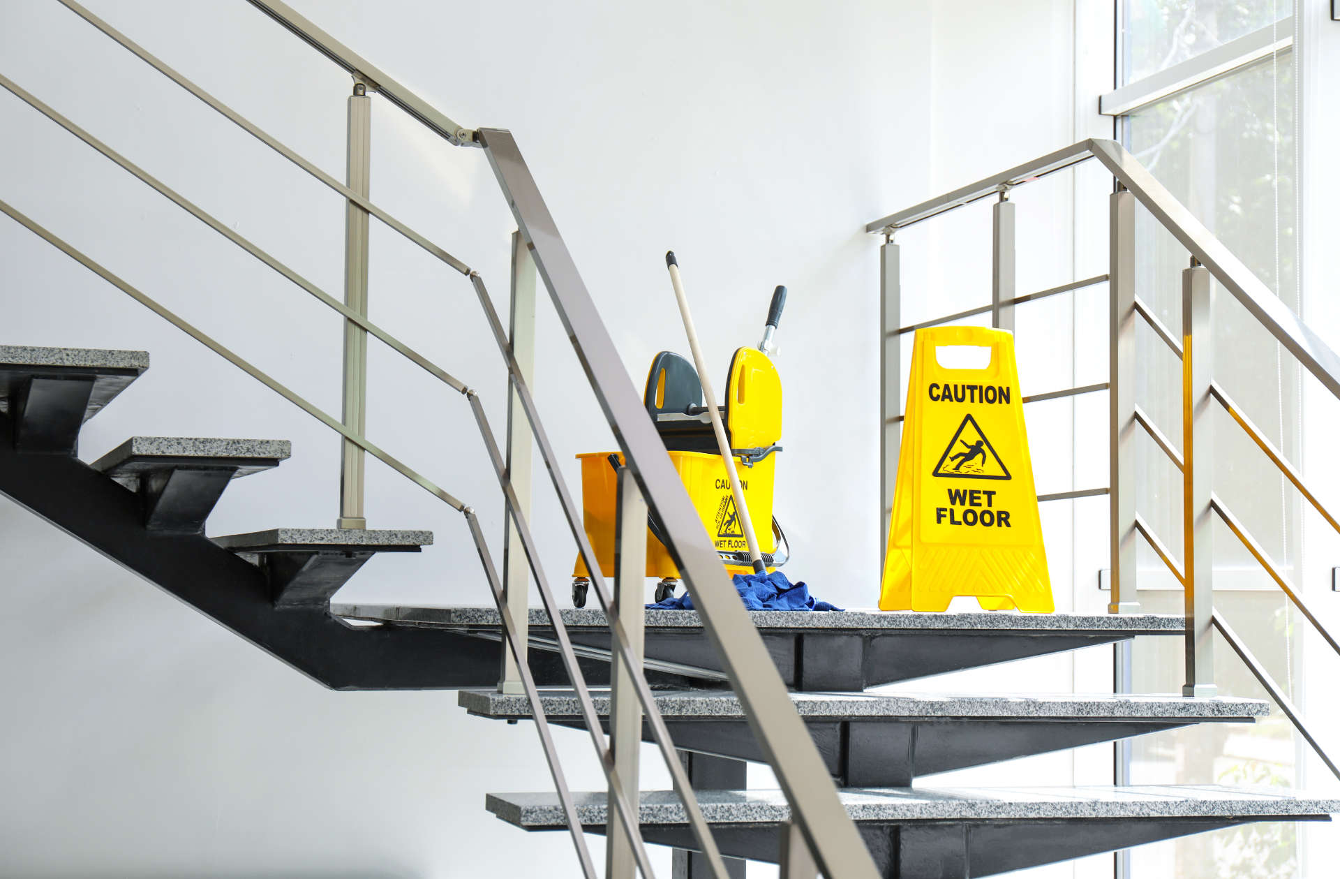 commercial cleaning Charlotte safety sign on stairs